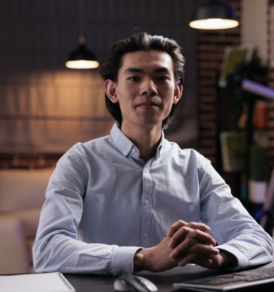 startup-employee-working-on-computer-1536x1024